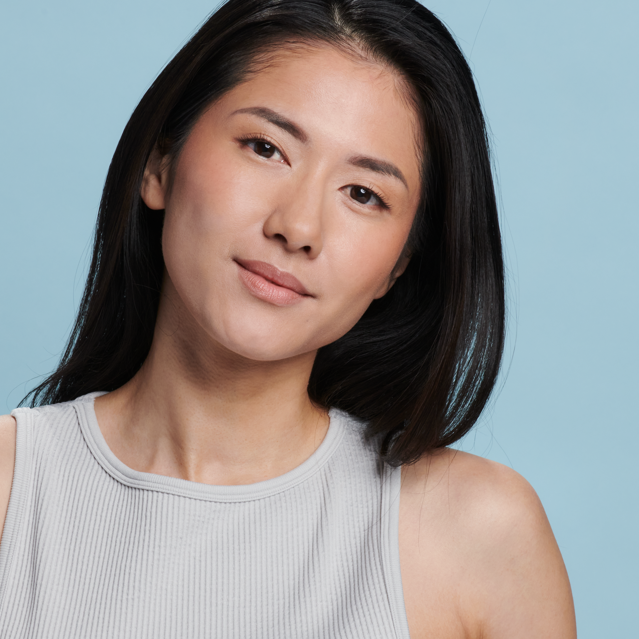 Model wearing Sunforgettable® Total Protection™ Face Shield Matte SPF 50 || all