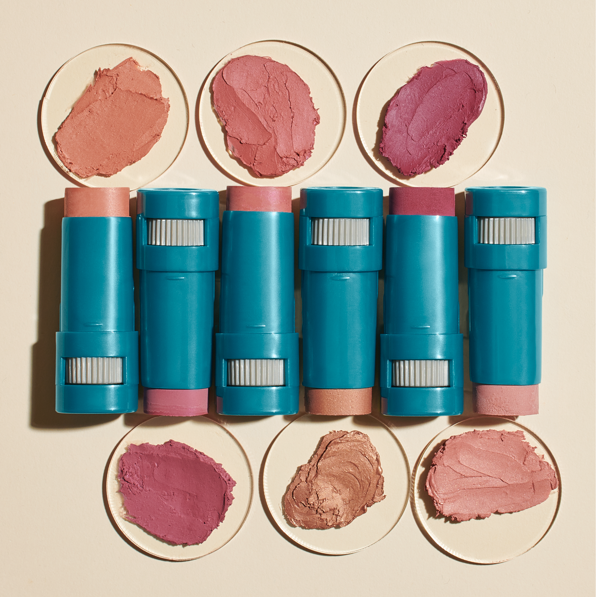 Color Balms SPF 50: top left to right: golden hour, pink sky, violet haze; bottom left to right: berry, bronze, blush || all